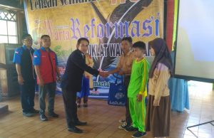 Moment HUT Warta Reformasi Ke-5 Berbagi Kasih kepada Anak Yatim Piatu