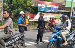BPI KPNPA RI Cabang OKUS Gelar Sosialisasi Kemanusiaan Bagikan 1500 Masker Gratis